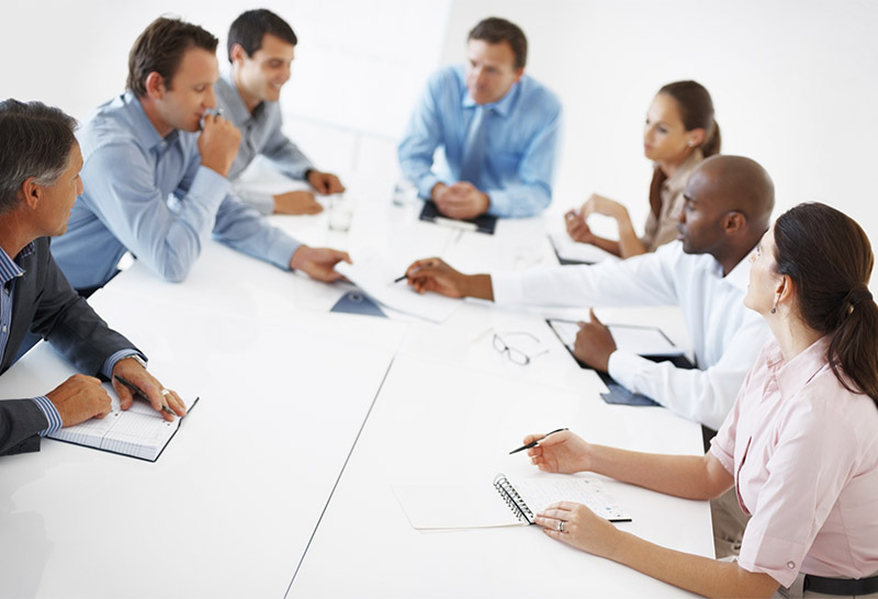 discussing health care change in a board room
