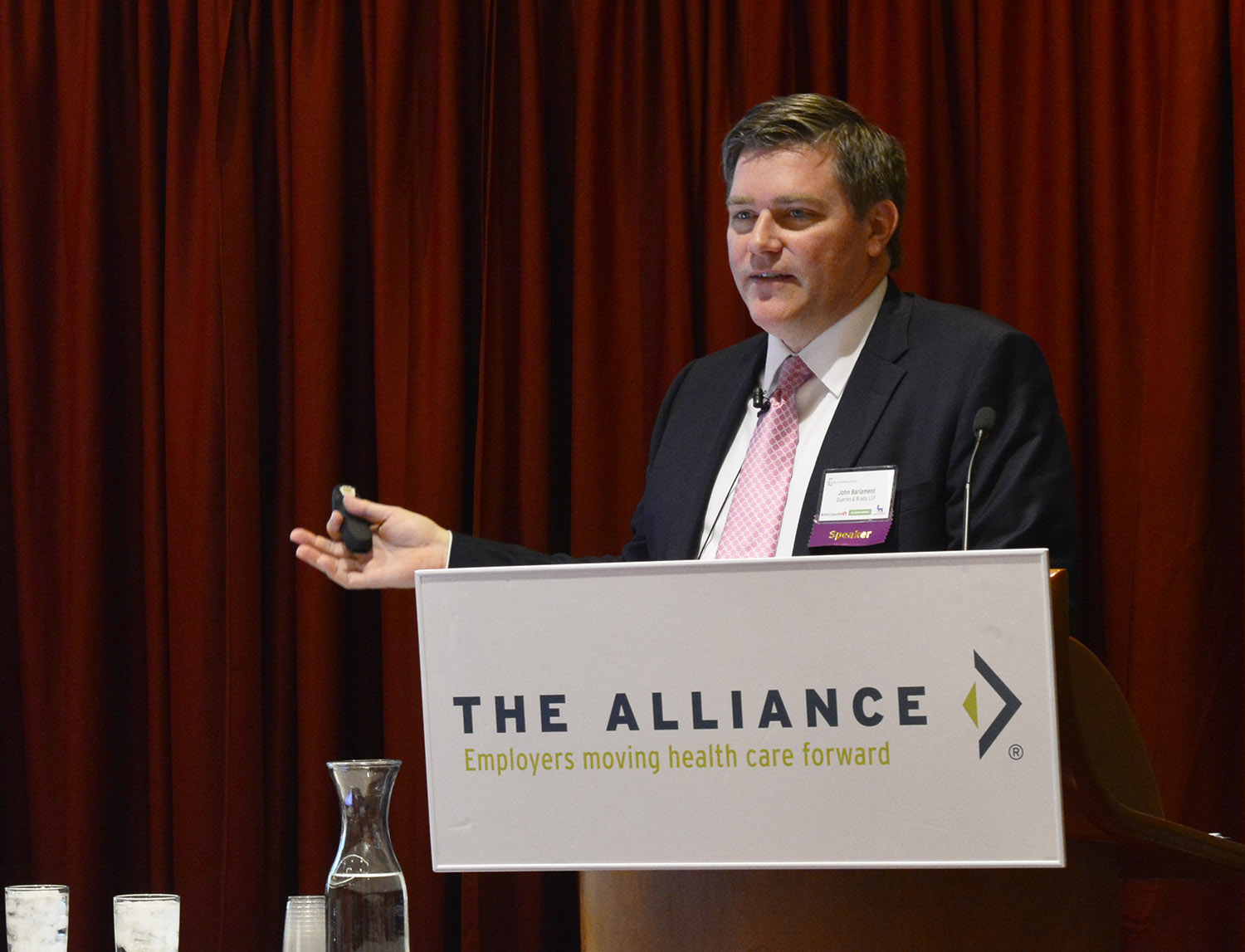 John Barlament speaking on health policy at an event by The Alliance