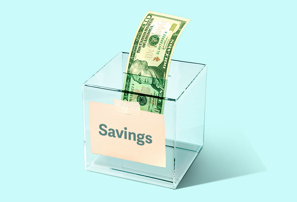 $10 bill in savings box